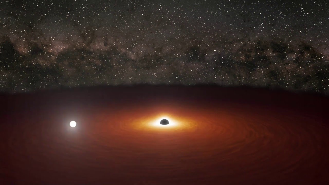 Wizja artystyczna pokazująca błysk światła wytwarzany w dysku akrecyjnym otaczającym supermasywną czarną dziurę.