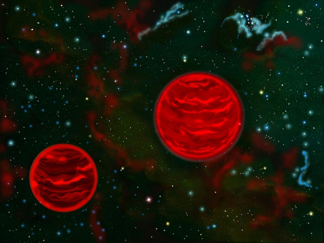Wizja artystyczna swobodnie unoszących się planet o masach Jowisza w układzie podwójnym.