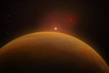 Wizja artystyczna planety dwukrotnie większej od Jowisza w układzie podwójnym GJ 896AB. 