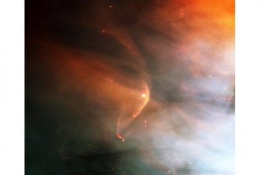 Zdjęcie w podczerwieni fali uderzeniowej utworzonej przez masywnego olbrzyma Zeta Ophiuchi w międzygwiezdnym obłoku pyłu